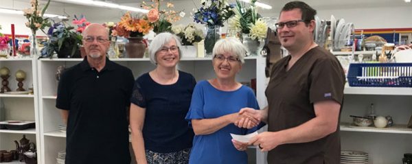 Morden Community Thrift Store presenting $3000 dollar cheque to Agassiz Medical Centre